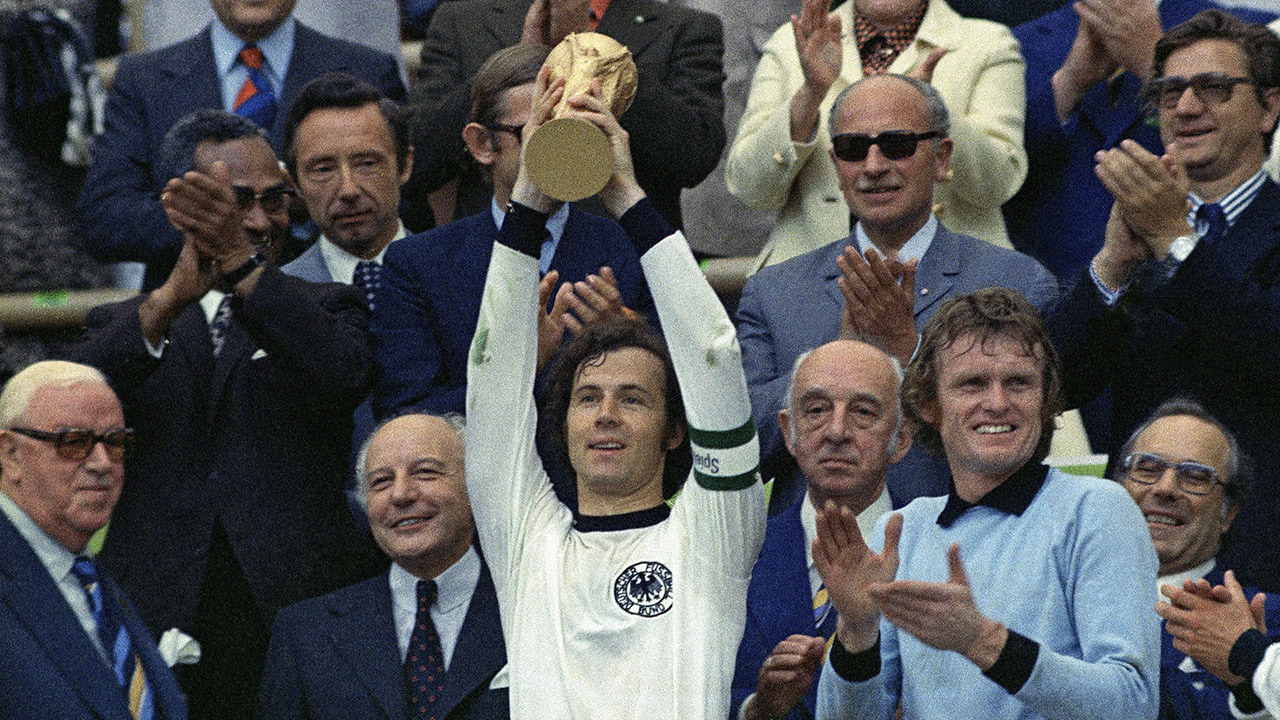 Franz Beckenbauer celebrates West Germany’s 1974 World Cup victory